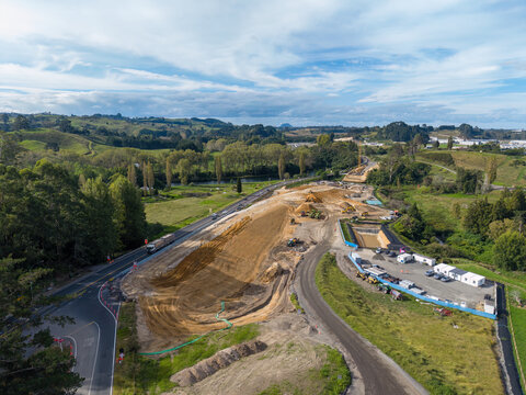 Earthworks at a bridge construction site beside the Omanawa River, Bay of Plenty, New Zealand. Aerial view