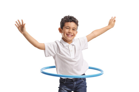 Cute little boy spinning a hula hoop