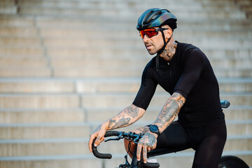 Naklejka premium Bike Rider With Intense Look Prepares For Fast Acceleration