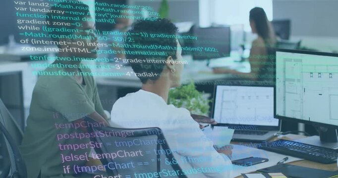 Seated developer following peer pointing at monitor at tech desk debugging with overlay scrolling