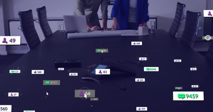 Male and female team unrolling plan, pointing and typing while cursor raising badges for business