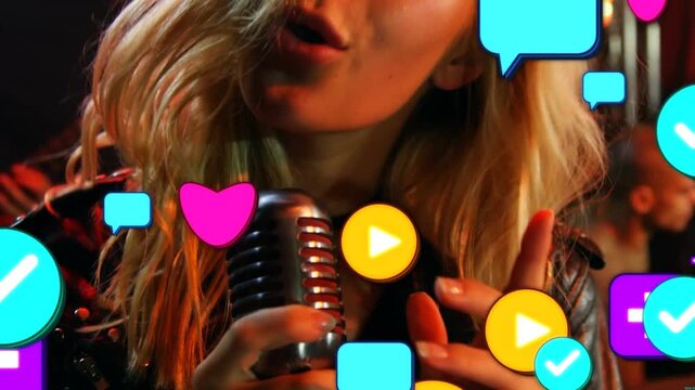 Vertical video: Singer singing with vintage mic on music stage, causing icons growing, showing buzz