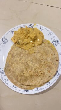 Aloo paratha with paneer curry