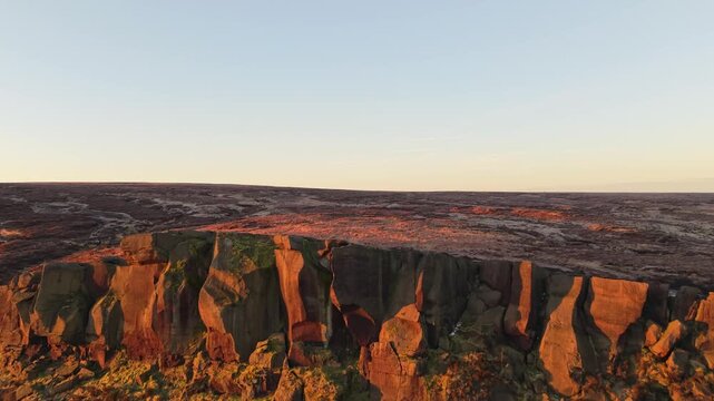 Drone panoramic exploration around Dovestone Reservoir in sunrise. Dove Stone Reservoir lies at the convergence of the valleys of the Peak District National Park, Greenfield, UK.