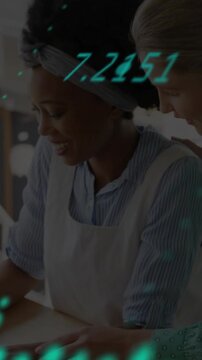 Vertical video: Seated woman leaning at bakery, friend touching, causing teal data overlay on phone