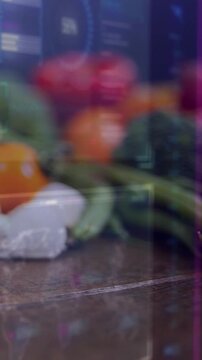 Vertical video: Produce on top getting focus pull, showing food for promo as UI casting purple-line