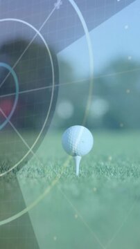 Vertical video: Camera pulling back revealing golf ball on tee, HUD data rotating for shot analysis