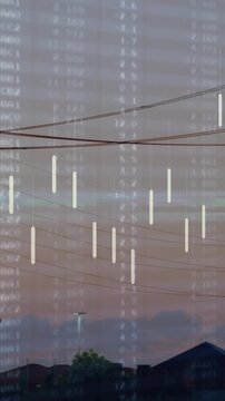 Vertical video: Power infrastructure being revealed by camera panning right showing network scale