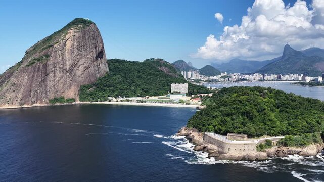 Rio De Janeiro Skyline In Urca Beach Rio De Janeiro Brazil. Turquoise Ocean Waves Gently Crashing On Tropical Beach. Shore Sky Clouds Beach Sea. Shore Beach Panoramic. Urca Beach Rio de Janeiro.