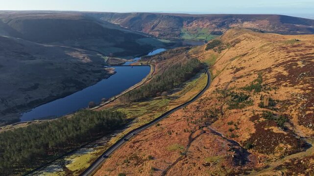 Aerial landscape views of  Greenfield and Dovestone Reservoirs. Dove Stone Reservoir lies at the convergence of the valleys of the Peak District National Park, Greenfield, UK.