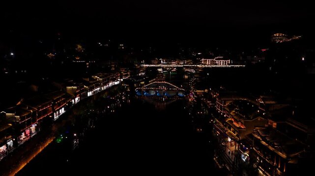 Fenghuang, China - 07.11.2025 Aerial flight over Tuojiang River, Fenghuang Ancient Town, China.