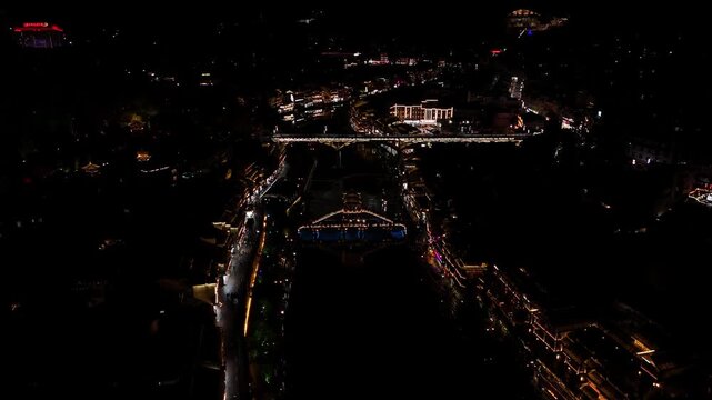 Fenghuang, China - 07.11.2025 Aerial flight over Tuojiang River, Fenghuang Ancient Town, China.