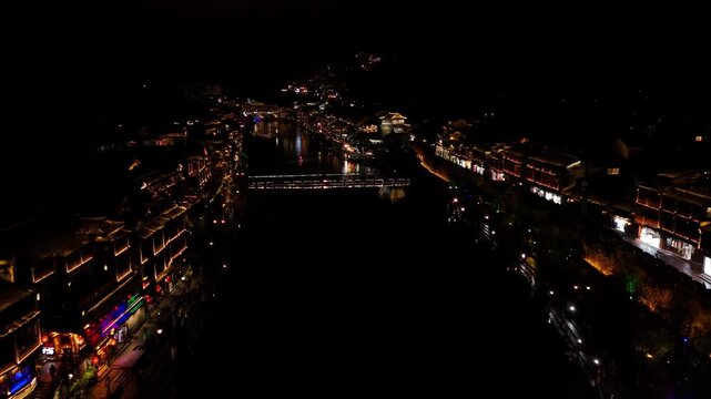 Fenghuang, China - 07.11.2025 Aerial flight over Tuojiang River, Fenghuang Ancient Town, China.
