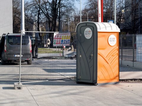 Orange Juta Agency mobile toilet at the construction site