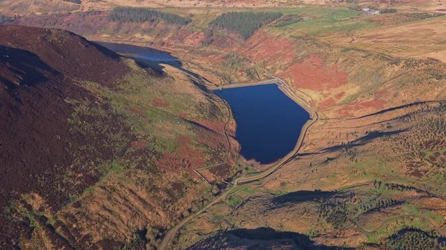 Drone POV of Greenfield Reservoir at the Peak District National Park, Greenfield Reservoir is a reservoir in the Saddleworth parish of the Metropolitan Borough of Oldham in Greater Manchester.