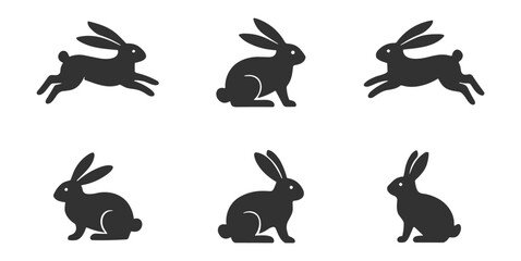 Fototapeta premium rabbit silhouettes vector set of sitting and running hare shapes on transparent background