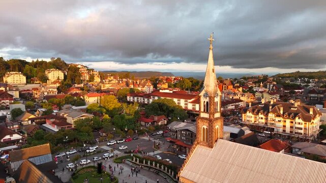 Aerial view of S&atilde;o Pedro Chucrch and houses with European Alpine architecture on Borges de Medeiros Avenue - Gramado, Rio Grande do Sul, Brazil