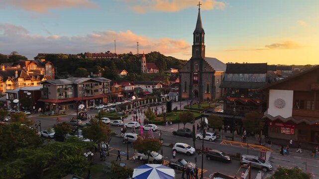 Aerial view of S&atilde;o Pedro Chucrch and houses with European Alpine architecture on Borges de Medeiros Avenue - Gramado, Rio Grande do Sul, Brazil