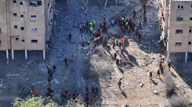 Aerial view Bat Yam Iranian missile impact destruction Israel

Drone footage showing missile strike damage in Bat Yam residential buildings Israel June 15 2025
