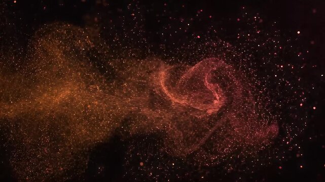 Bright orange sparks explode on a dark black background