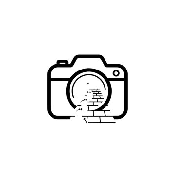 Camera Lens Breaking Brick Wall.