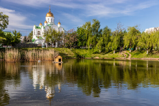 Nativity Cathedral  and a swan pond in Catherine the Great park in Tiraspol, capital of Transnistria.