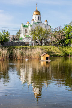 Nativity Cathedral  and a swan pond in Catherine the Great park in Tiraspol, capital of Transnistria.