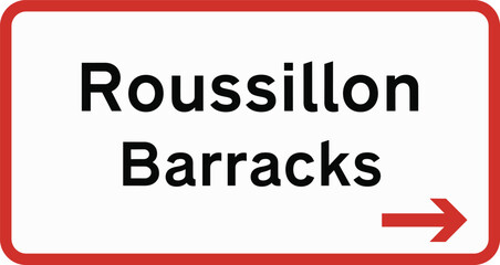 Fototapeta premium Roussillon Barracks Direction Sign with Right Arrow in White and Red Border for Military Location Guidance, Road Navigation, and Traffic Signage Design