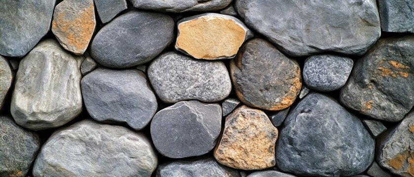 Smooth gray and brown stone wall texture