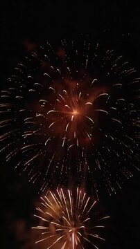 A stunning video of vibrant fireworks exploding in the night sky