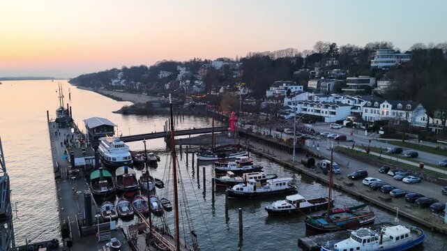 Hamburg Germany 2026 03 09: Aerial drone footage (descent) of the museum harbor and waterfront in &Ouml;velg&ouml;nne in Hamburg at sunset
