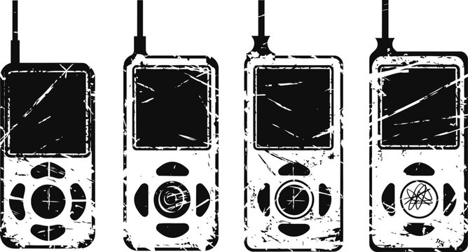 Four vintage mobile phones with scratched and worn screens standing in a row on white background