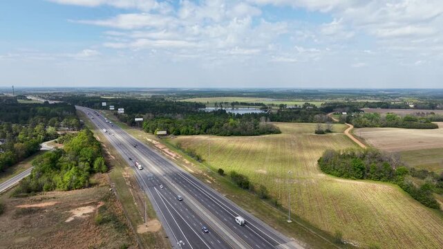 Aerial footage of cars driving on the highway in Ashburn Georgia USA