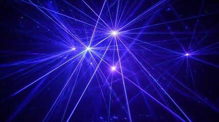 Bright blue and violet laser lights glow against a dark background.