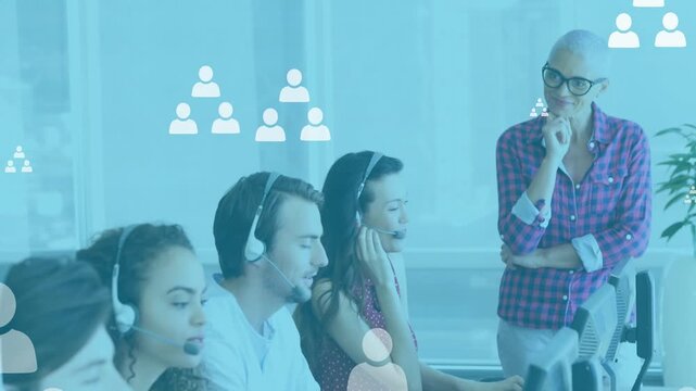Animation of online icons over diverse business people wearing phone headsets