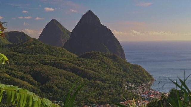 Cinematic View of the Pitons at Golden Hour: Gros Piton and Petit Piton Landscape with Soufriere Bay in St Lucia