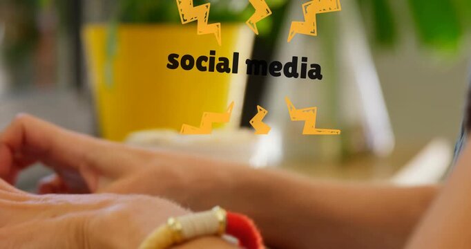 Social media text with thunderbolt icons against caucasian woman using laptop at a cafe