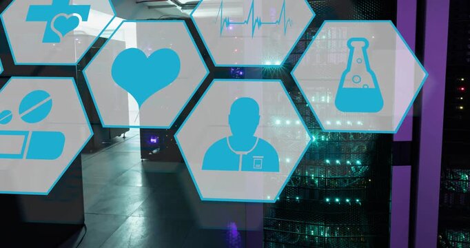Animation of multiple medical icons against computer server room