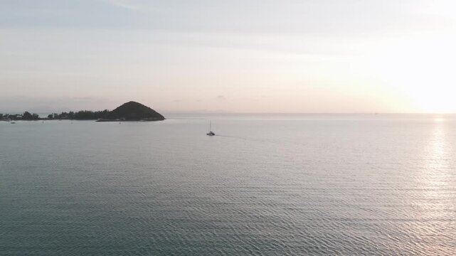 Catamaran sailing tranquil sea near koh samui island