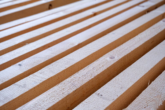 Parallel wooden strips for frame construction, wall partitioning, mounting, base for finish cladding, interior setup, renovation, drywall, joining system.