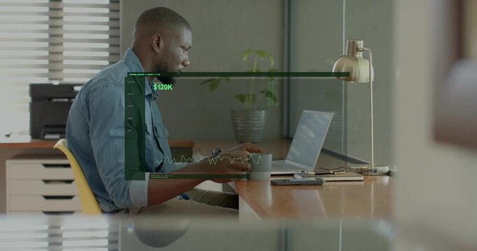 Man sitting at laptop reaching for mug, typing and checking finance HUD overlay showing $120K graph