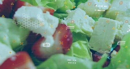 Displaying close-up salad at studio, with lettuce, cherry tomatoes, crumbled feta and HUD graphics © vectorfusionart