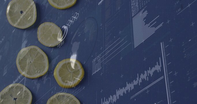 Displaying thin lemon slices lying flat on dark blue tabletop, with overlaid white graphs