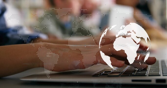 Typing adult hands wearing long-sleeve shirt pressing laptop keys at office, world map overlay