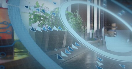 Fototapeta premium Floating faint AR ring and arrow markers hovering over sunlit floor by glass door, planter present