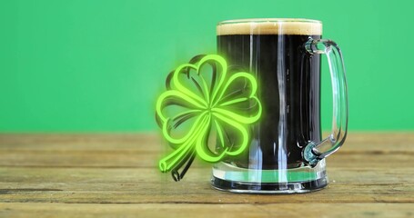Displaying beer mug sitting on wooden plank tabletop, neon shamrock casting green glow, copy space © vectorfusionart