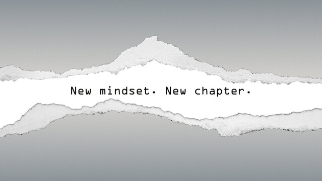 Inspirational quote &ldquo;New mindset. New chapter.&rdquo; on grey gradient background with torn paper effect, symbolizing renewal and forward movement.
