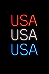 USA Neon Sign in Red White and Blue on Dark Background