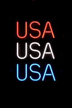 USA Neon Sign in Red White and Blue on Dark Background
