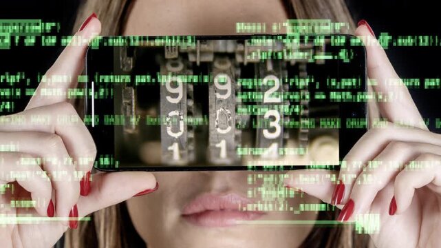 female with holding a smart phone with code and numbers